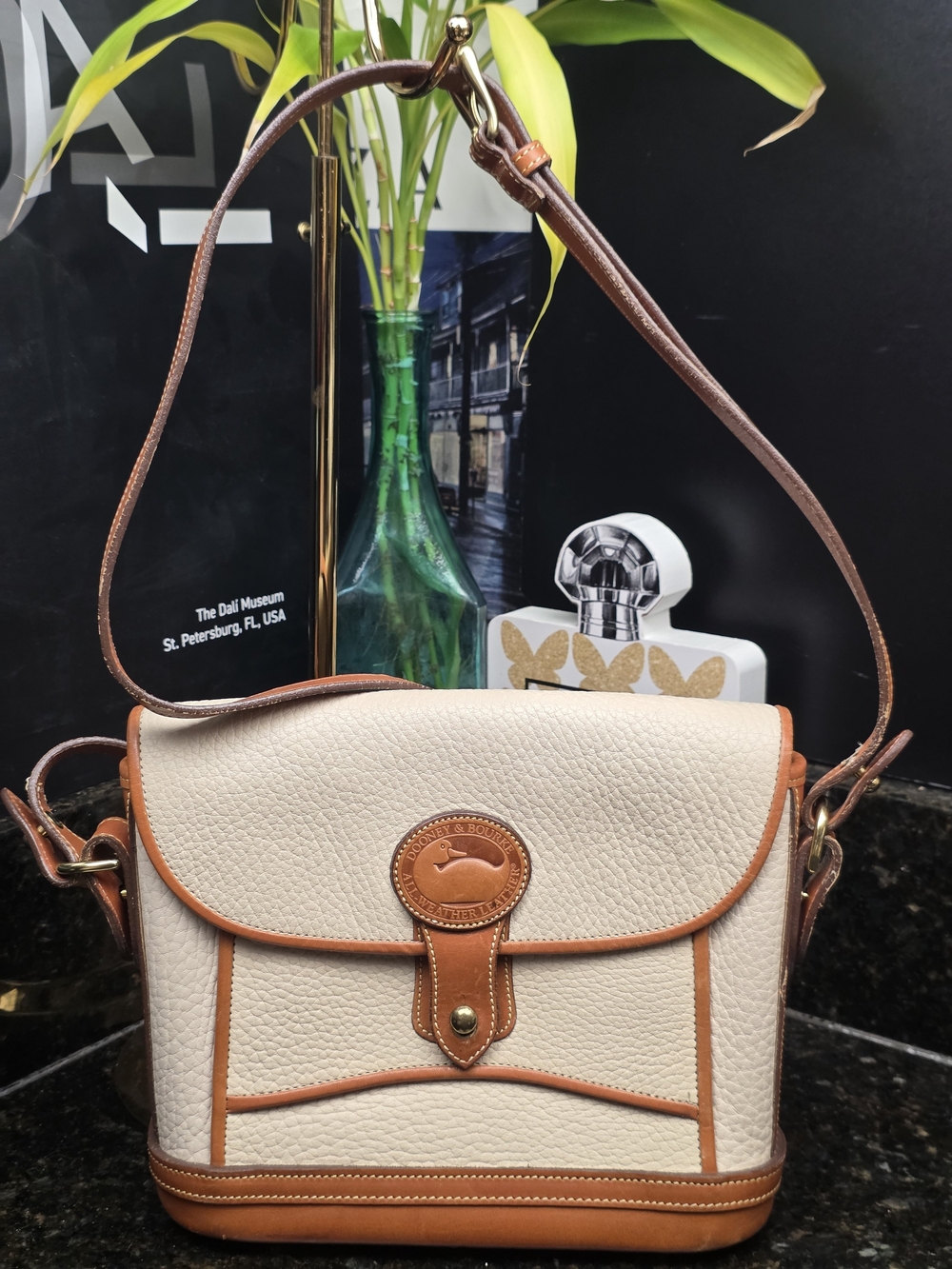Dooney & Bourke Cream Leather Crossbody Bag with Tan Trim